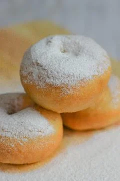 Three Delicious Powdered Donuts Stacked High Stock Photos