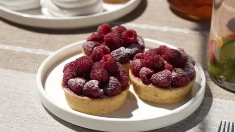 Three delicious raspberry cakes Stock Footage 314022986