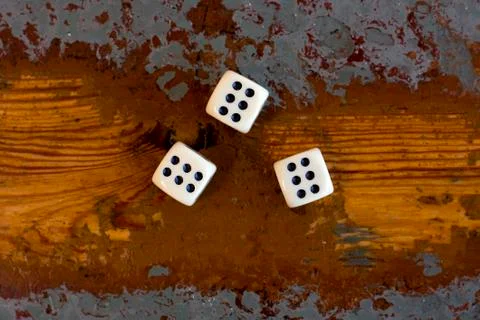 Three dice with number six Stock Photos