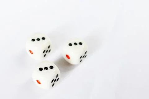 Three dices have triple three point isolated on white background. Stock Photos