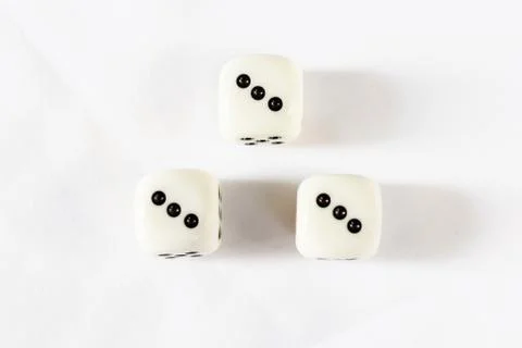 Three dices have triple three point isolated on white background. Stock Photos