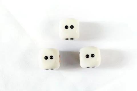 Three dices have triple two point isolated on white background. Stock Photos