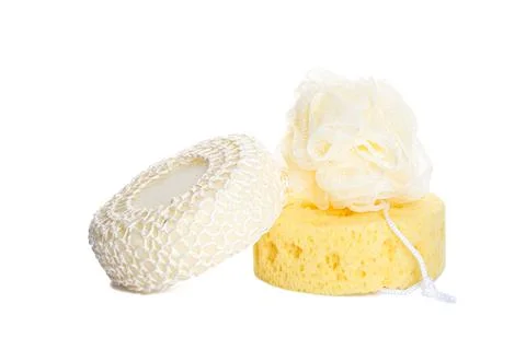 Three different bath sponges isolated on a white background. Bath accessories Foto stock
