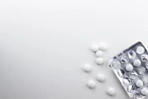 Three different blisters with white tablets of different form factors Stock Photos