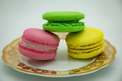 Three different colored biscuits in a plate 写真素材