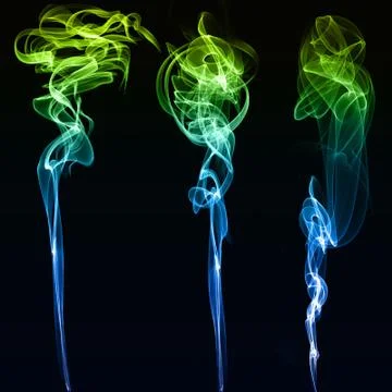 Three different colored smokes in black background Illustrazione stock
