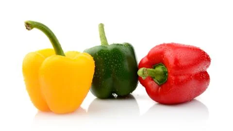 Three different coloured pepper isolated on white background Stock Photos