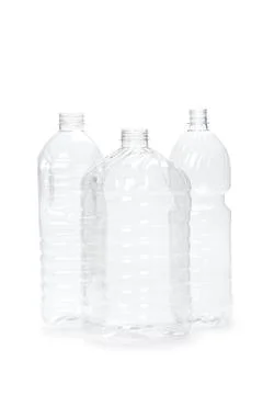 Three different empty plastic bottles isolated on white background. Stock Photos
