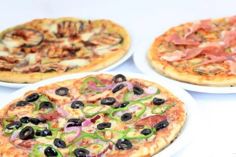 Three different kind of pizzas Stock Photos