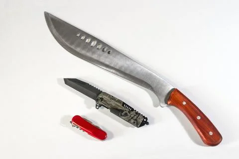 Three different kinds of knives in the studio on a white background Stock Photos