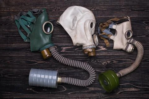 Three different old gas mask Stock Photos