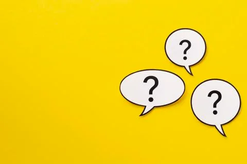 Three different shaped speech bubbles over a bright yellow background Stock Photos
