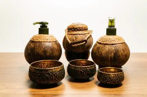 Three different size of brass bowl with three coconut spa set Stock Photos