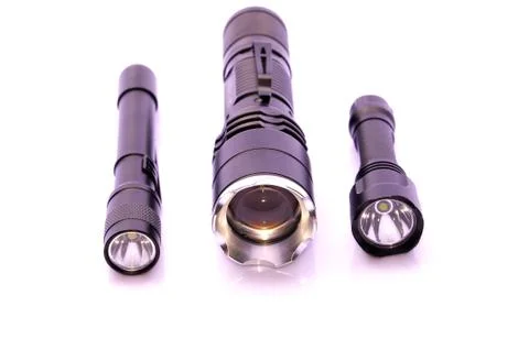 Three Different Size LED Torchlight Over White Background Stock Photos