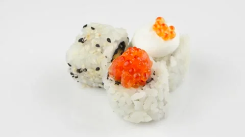 Three different sushi on white background rotating Stock Footage 55641458