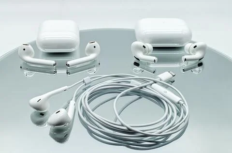 Three different systems of Apple Inc. earphone Stock Photos