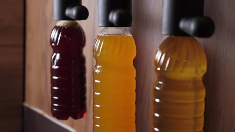 Three different types of beer are bottled in disposable bottles. Stock Footage 344038319