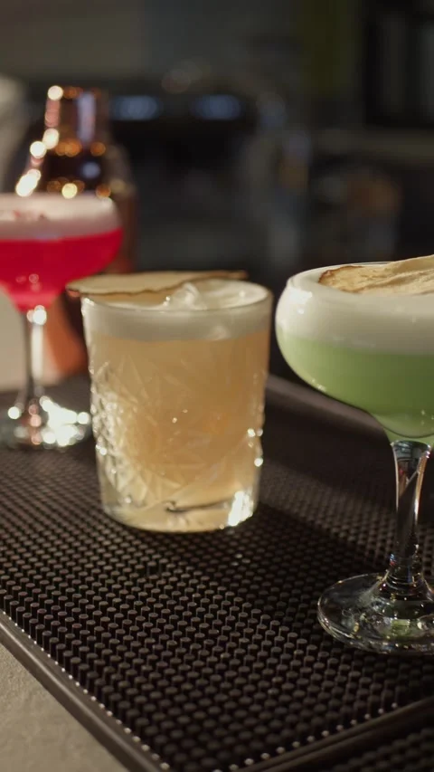 Three different types of blended cocktails in vibrant colors. Stock Footage 271200433