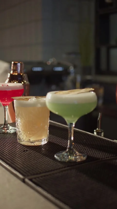 Three different types of blended cocktails in vibrant colors. Stock Footage 271200435