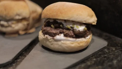 Three Different Types of Hamburgers in Dinner Balcony Stock Footage 128987068