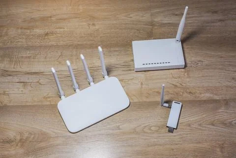 Three different types of Wi-Fi routers, modern and old technology. Wireless.. Stock Photos