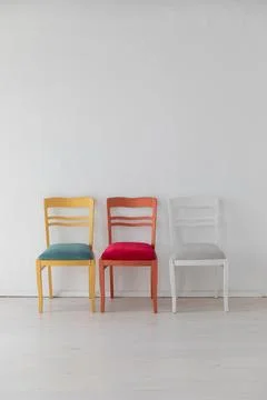 Three different vintage chairs in the interior of a white room Stock Illustration