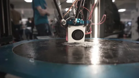 Three-dimensional 3D printer makes drawing on a flat surface. 動画素材 120688168