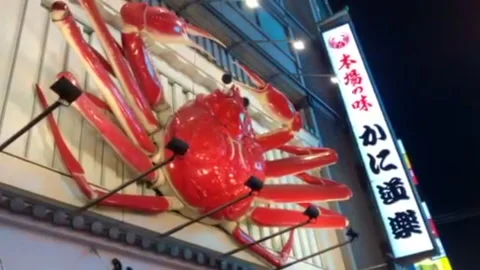 Three dimensional crab signboard in Dotonbori district in Osaka, Japan Stock Footage 161764312