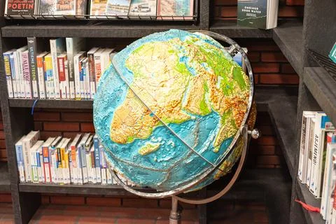 Three Dimensional Globe in a Library Stock Photos