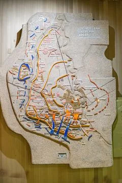 A three-dimensional map on display features various geographical elements, in Stock Photos