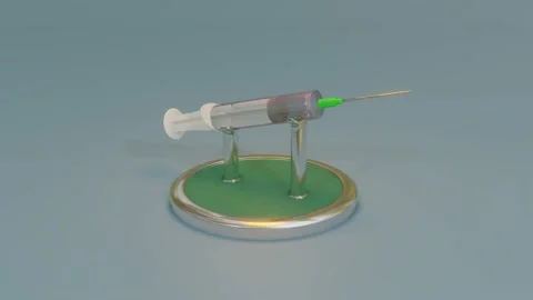 A three-dimensional model of a disposable syringe on an exhibition stand rotates Stock Footage 155172640
