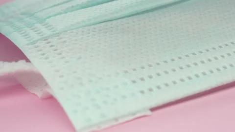 Three-dimensional non-woven mask, close up video clip.4k macro detail. Stock Footage 155285529