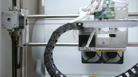 Three dimensional printer during work, 3D printing in action. Stock Footage 114329443