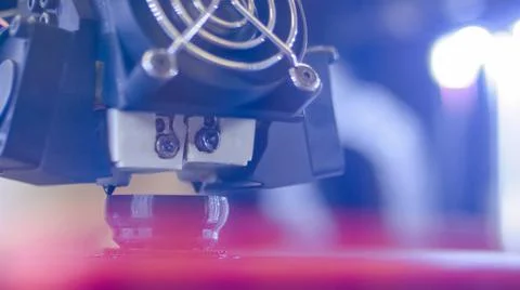 Three dimensional printing machine prints physical 3D model - close up Stock Photos