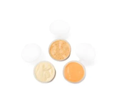 Three dip sauces in a plastic take away container Fotos Stock