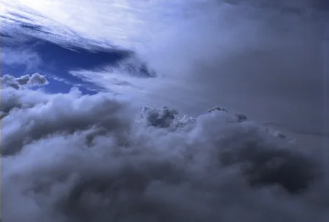 Three distinct layers of clouds can be seen as the camera takes a leisurely Video stock 86832308