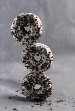 Three donuts stacked on top of each other Stock Photos