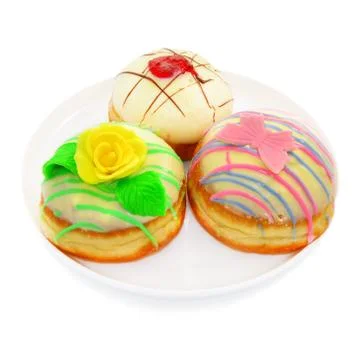 Three donuts with white chocolate Stock Photos
