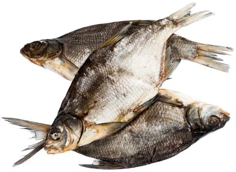 Three dried and solt bream fishes, isolated on white background Stock Photos
