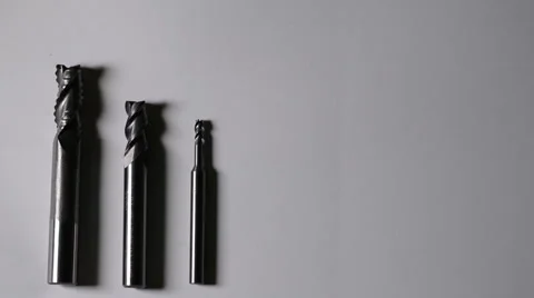 Three drills of CNC machine isolated on white background with light moving Vídeo Stock 48999435