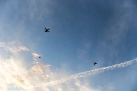 Three drones in the sky Stock Photos