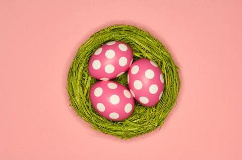 Three easter eggs with colorful background Stock Photos