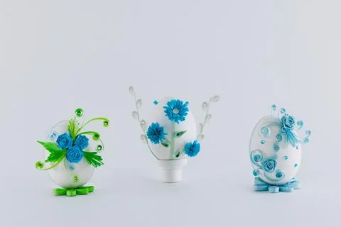 Three Easter eggs decorated with quilling Stock Photos