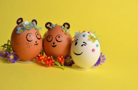 Three Easter eggs with funny faces. Spring. Easter. Stock Photos