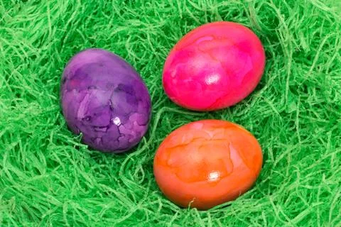 Three easter eggs in the grass Foto stock