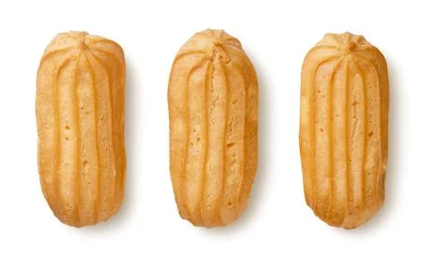 Three eclairs isolated on a white. Top view Stock Photos