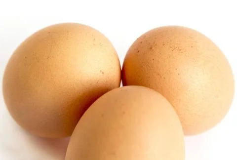 Three eggs from above Three eggs isolated on a white background. Copyright... 스톡 사진