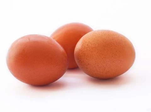 Three eggs isolated on white background Stock Photos