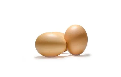 Three eggs  isolated on white background. Stock Photos
