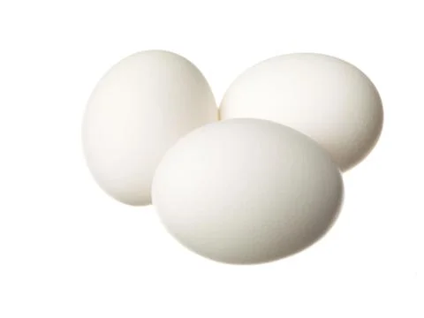 Three eggs isolated on white Stock Photos